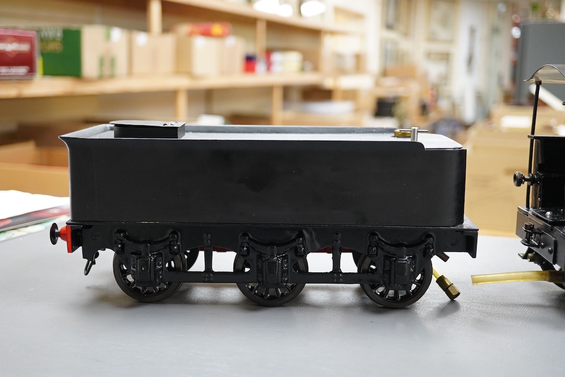 A Gauge 3 model railway live steam Bassett-Lowke 4-6-0 tender locomotive, ‘Experiment’ 66, fitted with a John Shawe manufactured ‘C’ type boiler and related paperwork, meths fired with two inside cylinders, the cab fitte